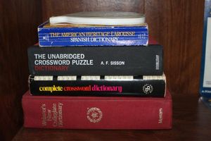lot 79 image: Book Websters New Collegiant Dictionary, Complete Crossword Dictionary, The Unabridged Crossword Puzzle, The American Heritage Larousse Spanish Dictionary, Sit & Solve Cross Sums