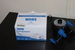 lot 98 image: SDOM Compressor and travel air pump