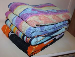 lot 104 image: Four Swim Towels