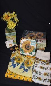 lot 129 image: Sunflower Gift Boxes Faux Flower and Kitchen Linens