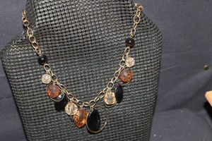lot 150 image: Gold Tone and Silver Tone Necklaces with Brown Multi colored Beads