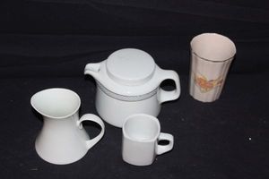lot 211 image: Tea Pot, Creamer, Tea Cup and ceramic Cup