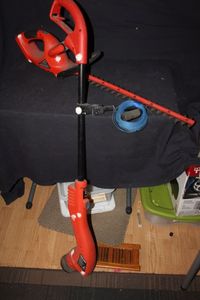 lot 312 image: Electric Weed eater and Electric Hedge trimmer
