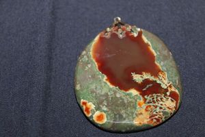 lot 329 image: Polished Rhyolite Rainforest Jasper Pendant, Sliced