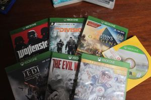 lot 169 image: Seven Xbox One Games