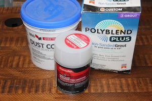 lot 242 image: Grout, Grout compound, and Bondo