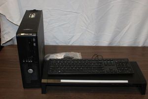 lot 252 image: Dell Computer Tower and KeyBoard with USB outlet Stand