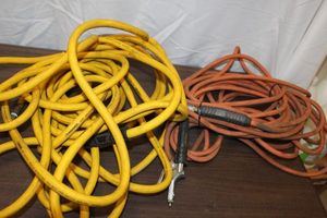lot 273 image: Two Long Lengths of Air Hoses