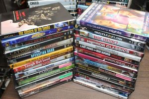 lot 312 image: MoviesThirty-Two DVDs See Photos for More Information