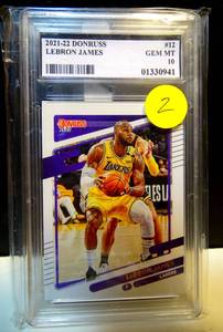 lot 2 image: GRADED GEM MINT 10 - 2021-22 DONRUSS LEBRON JAMES #12