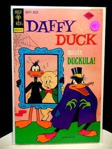 lot 46 image: RARE 1956 DELLGOLD KEY DAFFY DUCK MEETS DRACULA #92 $$