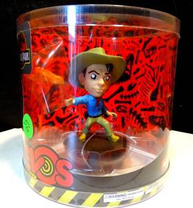 lot 56 image: NEW REVOS JURASSIC PARK DR ALAN GRANT VINYL FIGURE