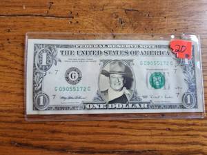 lot 20 image: John Wayne themed dollar bill