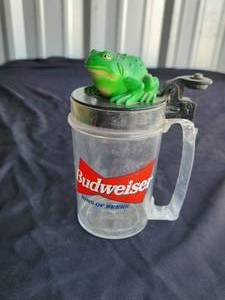 lot 50 image: Vintage Budweiser frog musical beer stein