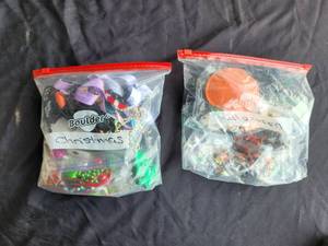 lot 69 image: Selection of Holiday and sports themed party items - mostly necklaces