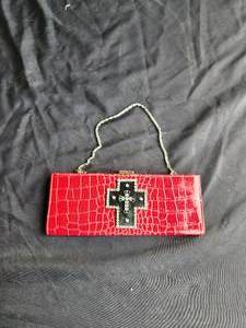 lot 111 image: Cross themed red and black purse