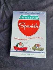 lot 115 image: Unopened how to learn Spanish CDs