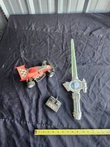 lot 96 image: Remote control card and toy sword