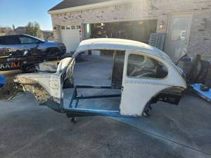 lot 2 image: 1970 Volkswagen body along with other parts with some new ones. No title, paperwork etc..  Customer started project and stopped.