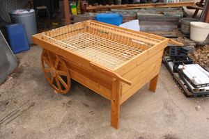 lot 4 image: Outdoor garden wagon with wire insert