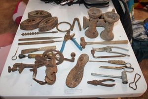 lot 63 image: Vintage tools and cast iron tools, sad irons