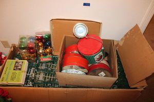 lot 98 image: Christmas tree, lights, ornaments and tins