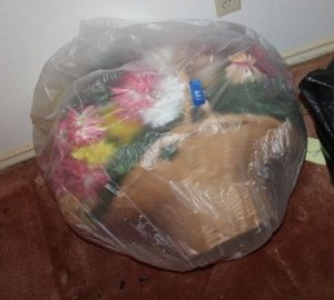 lot 119 image: Large basket with flower arrangement