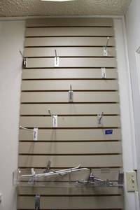 lot 151 image: Slat walls and hooks (bring tools to remove)