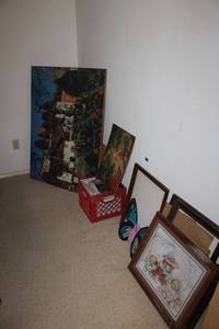lot 159 image: Wall art and frames with finished puzzles