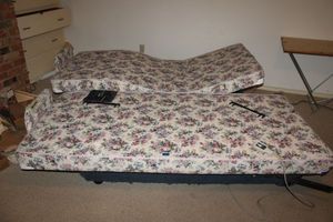 lot 163 image: King size or 2 twin adjustable lift bed as shown