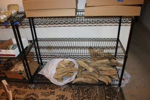 lot 165 image: Black wire shelf unit with locking wheels