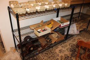 lot 166 image: Black wire shelf unit with locking wheels