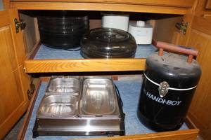 lot 43 image: Dehydrator, ice cream maker, divided food warmer, and Handi-Boy cooler