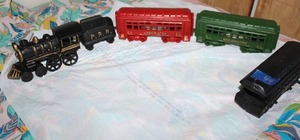 lot 49 image: Cast iron train set, see photos
