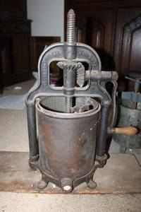 lot 197 image: Antique cast iron sausage press or fruit press