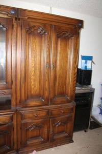 lot 207 image: Solid wood cabinet with locking key