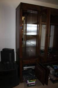 lot 201 image: Solid wood cabinet with glass shelves and door