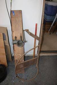 lot 216 image: Vintage meat grinder and wooden tool