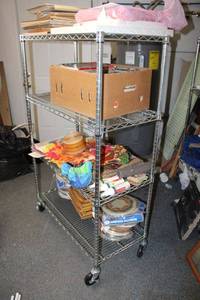 lot 226 image: Chrome wire shelfing unit with locking wheels
