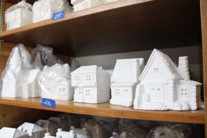 lot 236 image: Unpainted Ceramic Bisque village houses