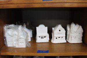lot 245 image: Unpainted Ceramic Bisque village houses