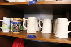 lot 271 image: Unfinished ceramic Bisque steins. Some are partially painted.