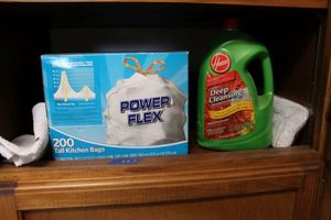 lot 283 image: Tall kitchen bags and Hoover deep cleansing jug