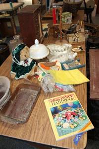 lot 298 image: Misc. lot pie plates, Disney party handbook, plush bear, pocket knife, telephone pencil sharpener