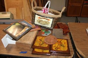 lot 299 image: Wood wall art, picture frames, potatoe basket and more