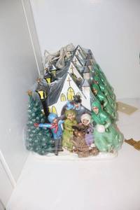 lot 327 image: Painted ceramic carolers by the church as shown