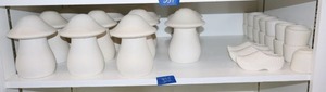 lot 332 image: Unfinished ceramic bisque mushrooms, clogs, and small cups