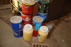 lot 377 image: Coffee cans with sand and rocks as shown