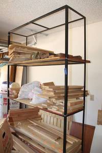 lot 459 image: Large shelving unit with generous amount of wood pieces