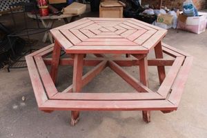lot 570 image: Wood hexagonal picnic table